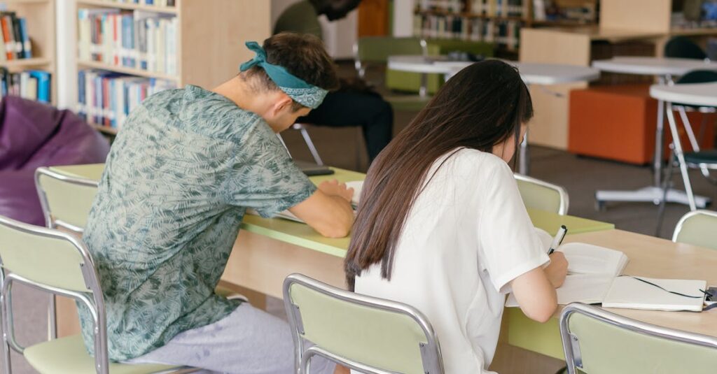 Adult students studying in a cozy university library environment, focusing on learning.